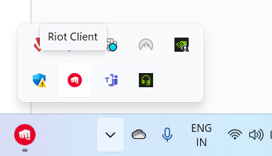La barra delle app di Windows mostra le app in esecuzione, incluso Riot Client